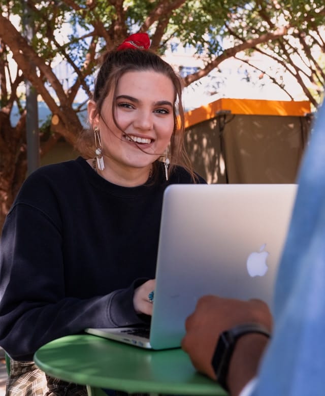 Happy person using laptop Happy person using laptop