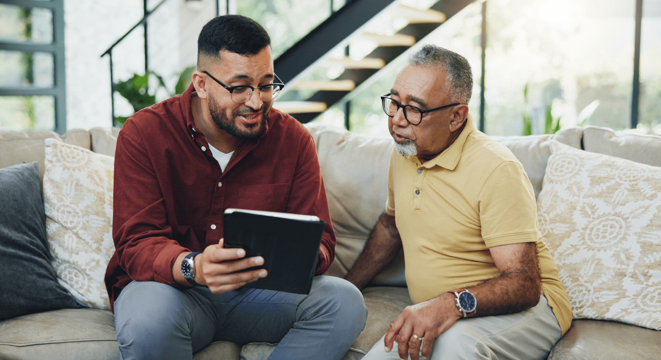 Schedule Appointment 3 Family helping senior with tablet